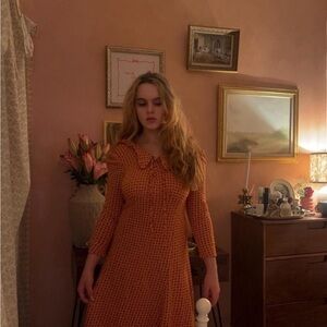 Orange vintage 70s dress with a collar and tie front!